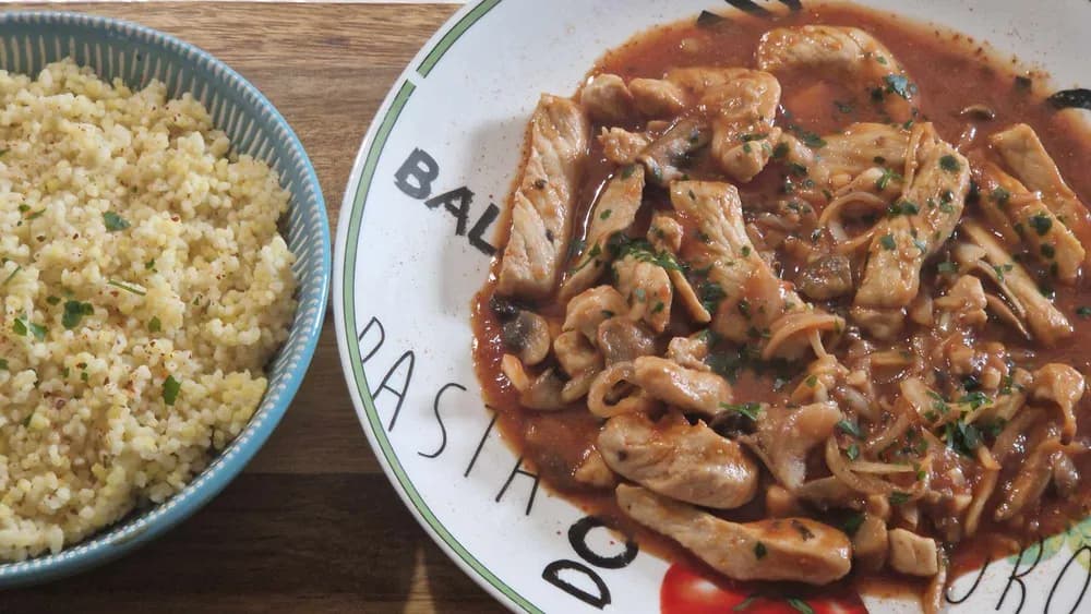 Image Emincés de Porc Champignon Tomate